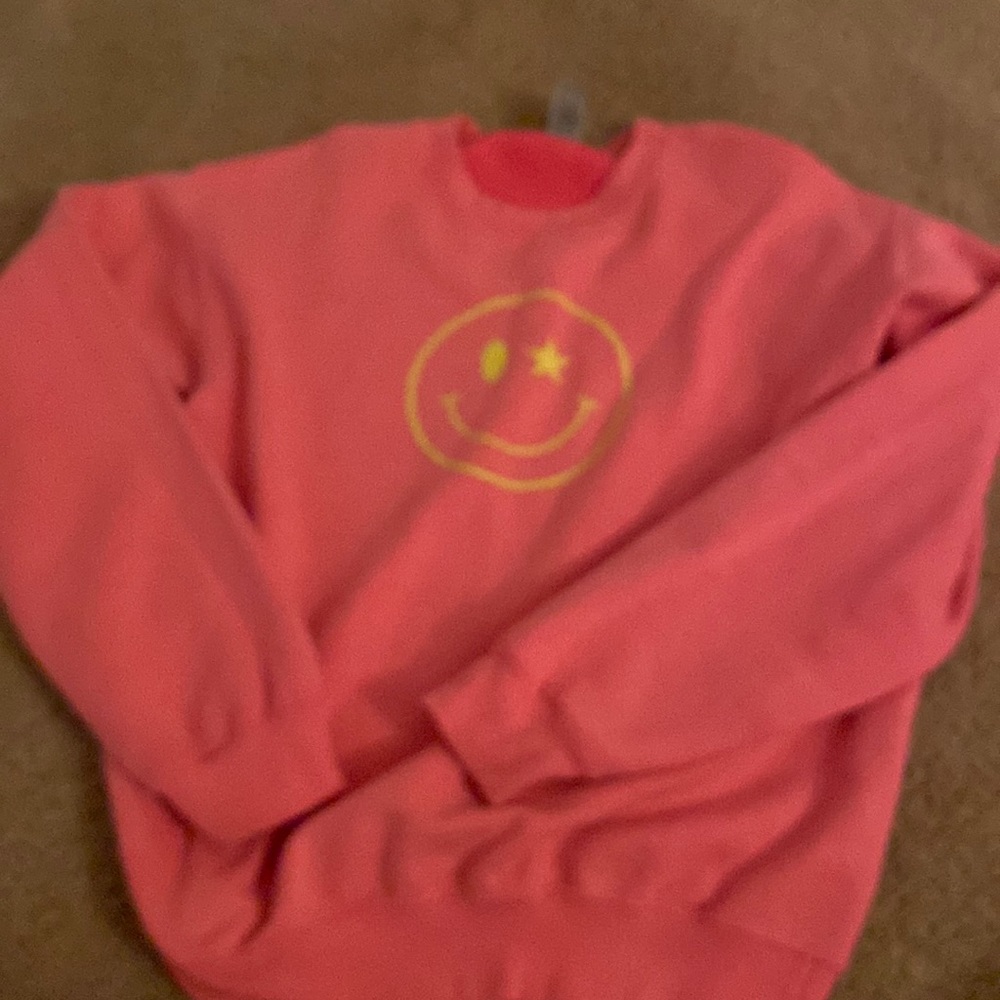 Neon, pink smile face sweatshirt